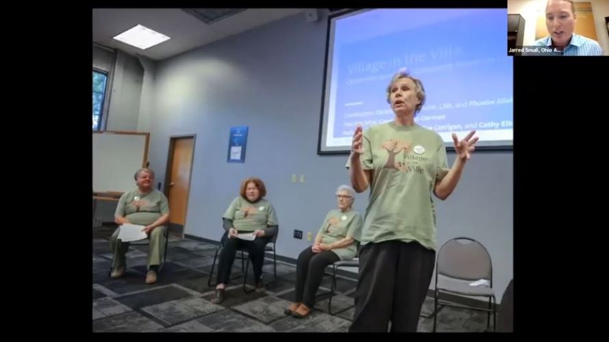 A screenshot of a presentation. A man is shown in a small webcam in the upper right-hand corner. An image of older adults dancing is shown on screen.