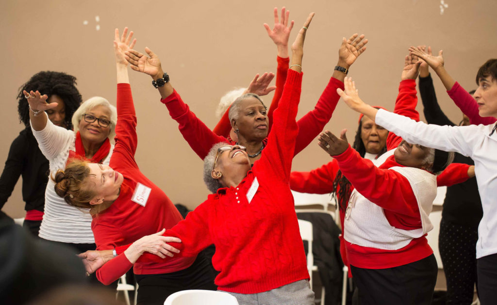 Dances for a Variable Population performers dance in unison.